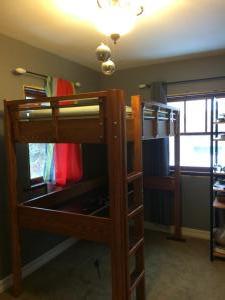 Solid ash "loft bed" bed on top, desk below