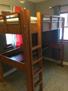 Solid ash "loft bed" bed on top, desk below